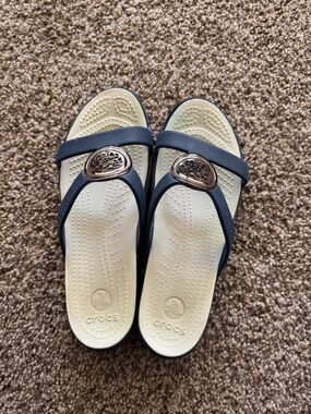 CROCS Navy and Cream Slide Sandals with Rose-Gold Accent